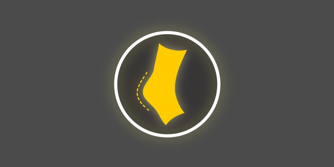 Icono amarillo y blanco con un talón de pie dentro de un círculo, sobre fondo gris oscuro, que representa la reducción de las rozaduras y el roce.
